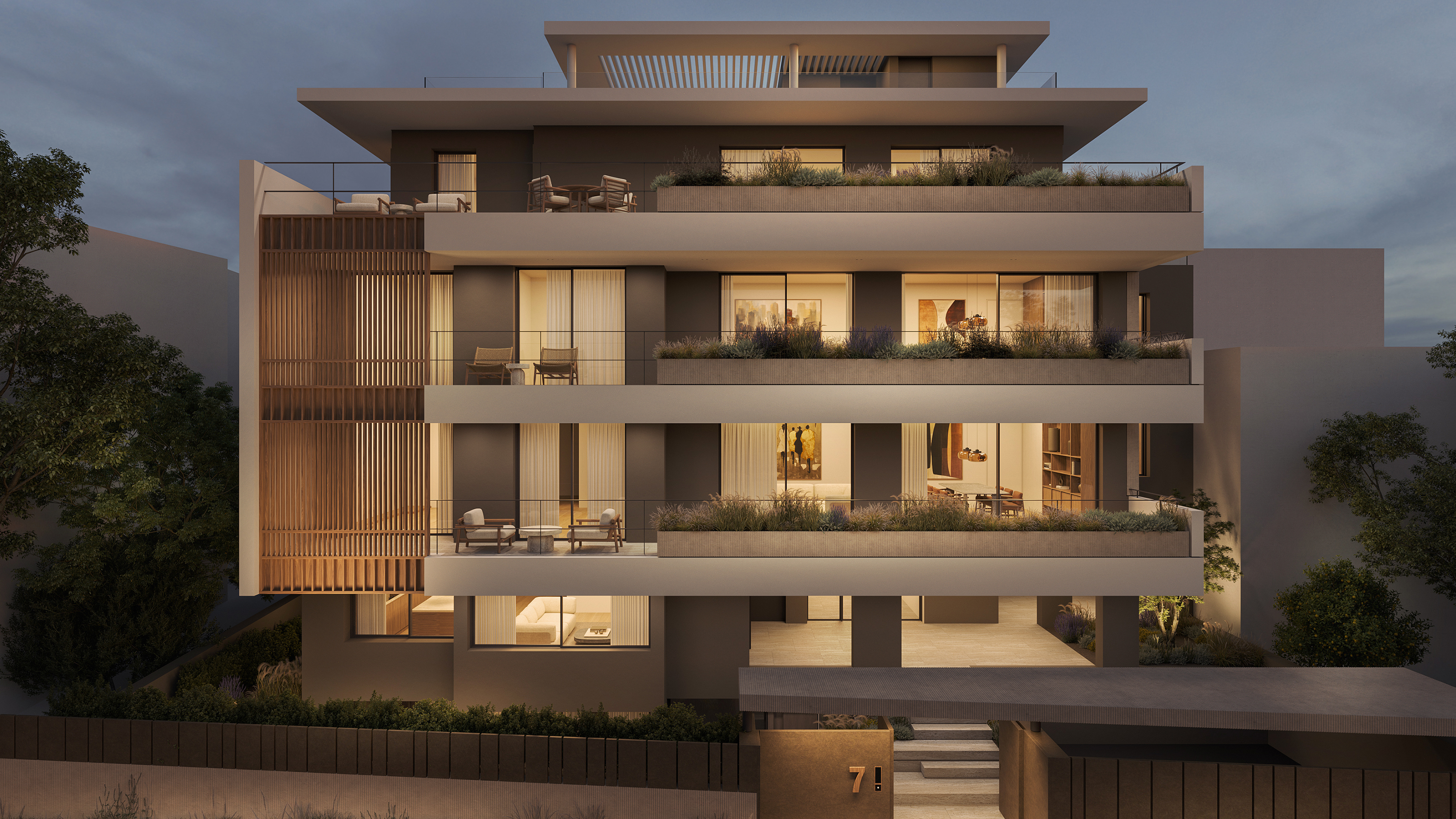 APK Architects-Night view of the renovated residential building with redesigned façade and balconies.